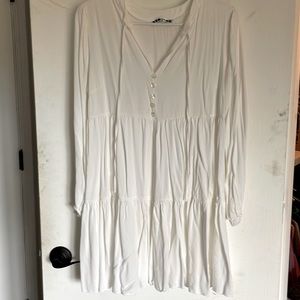 White mini dress. Long sleeves